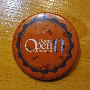 Doors Open Richmond' Pin - Orange with Splatter Design - Unique Accessory!